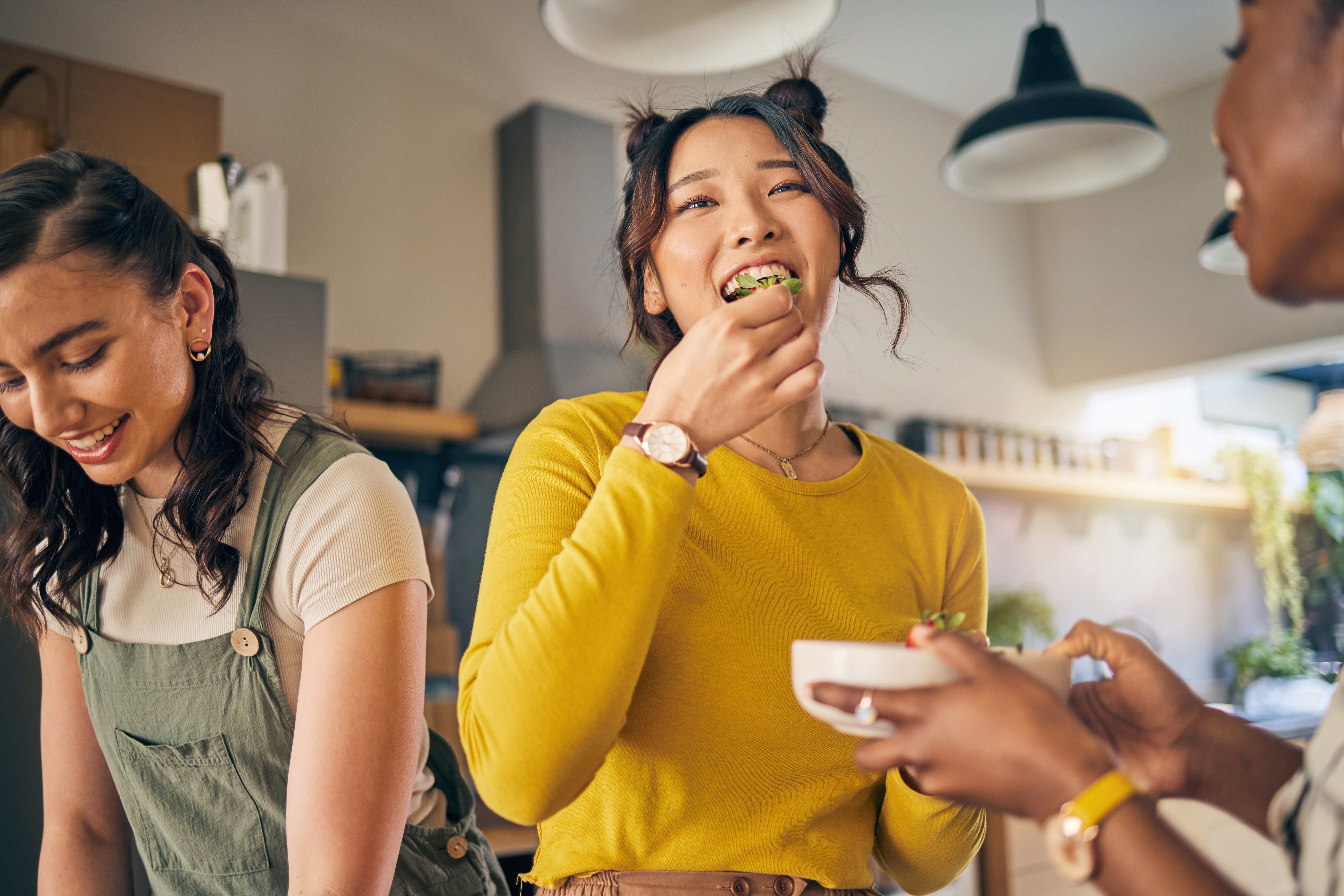 friends eating and smiling