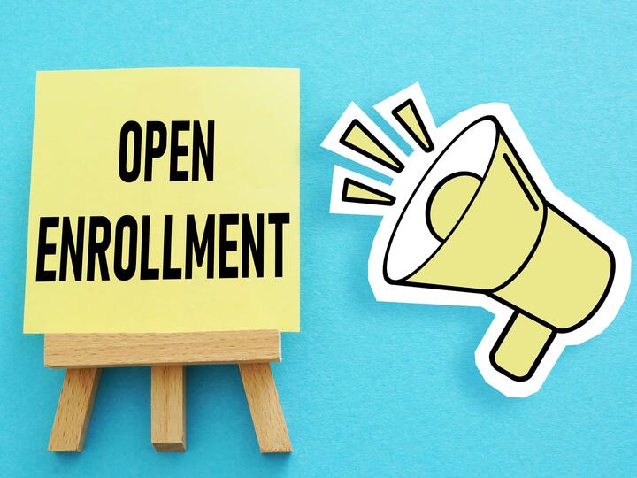 Open Enrollment sign with megaphone