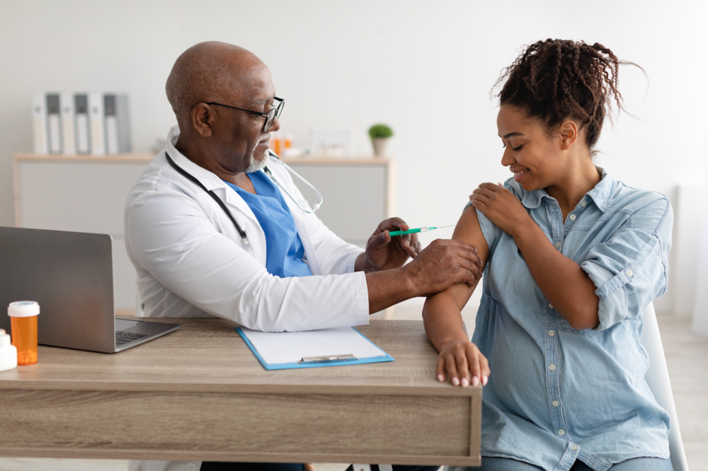pregnant woman getting vaccinated