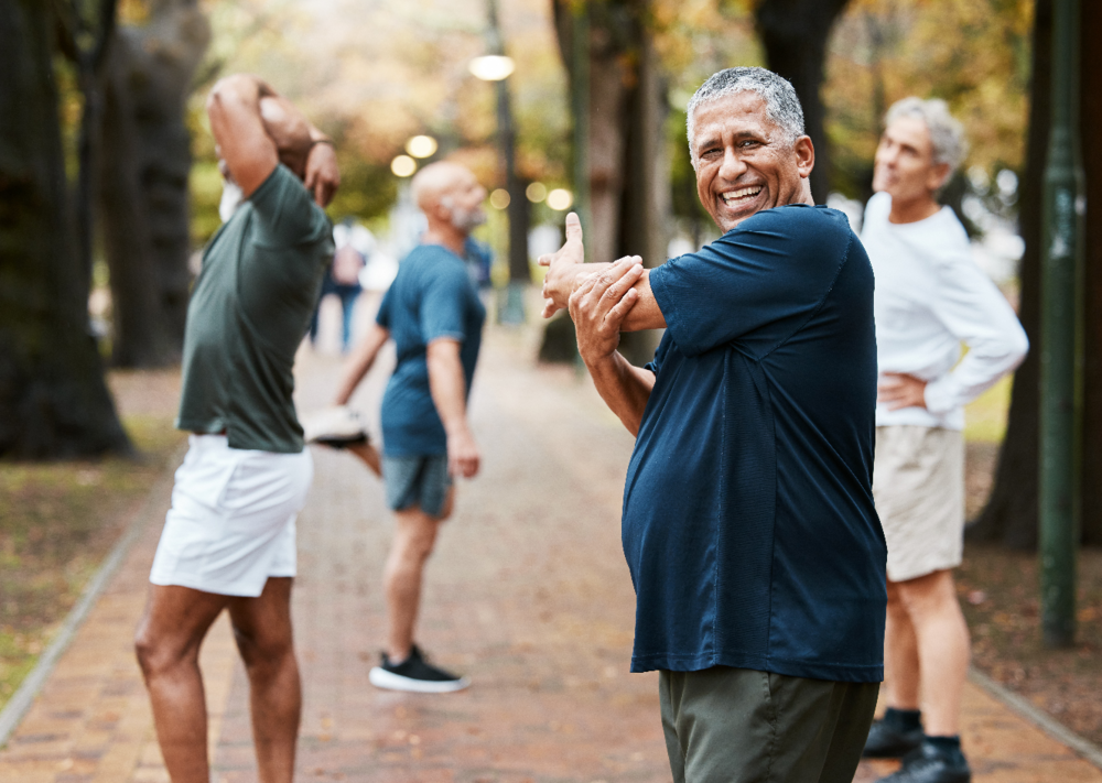 group of men exercising in park