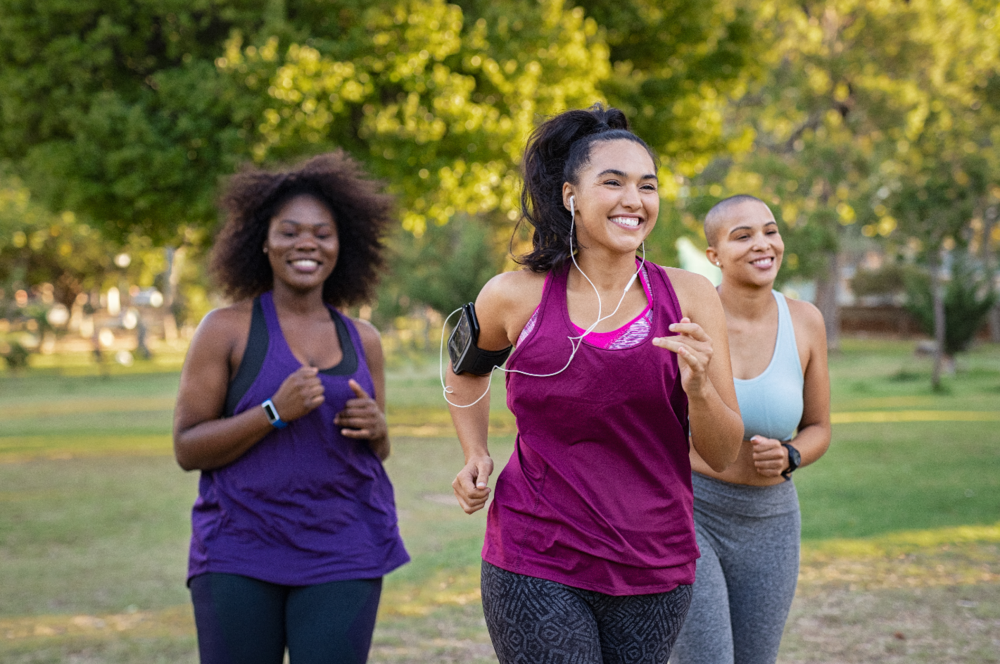group of women exercising in park